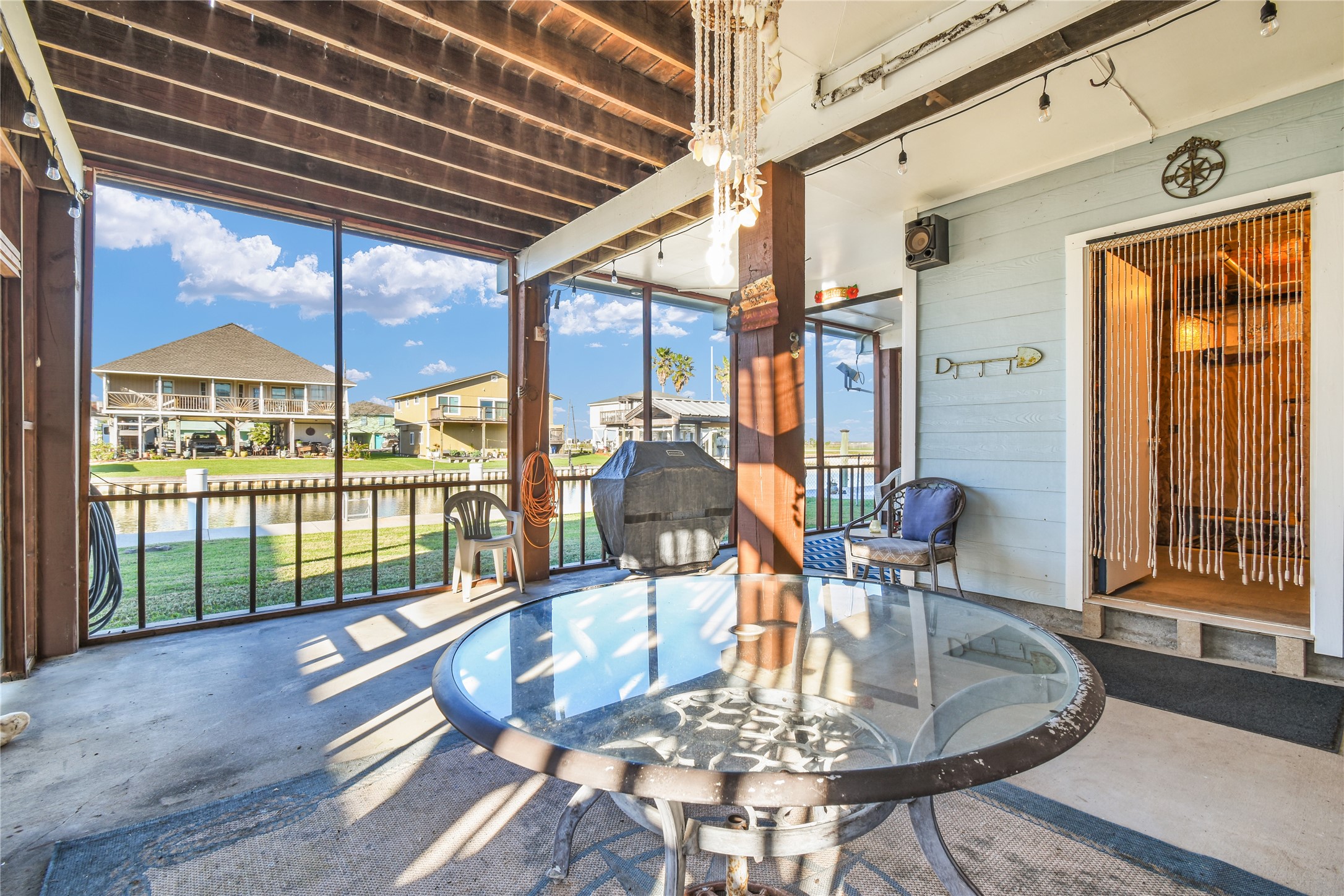 114 Four Master Road Freeport, TX 77541 - Photo 15 of 37 a dining room with glass top table and chairs