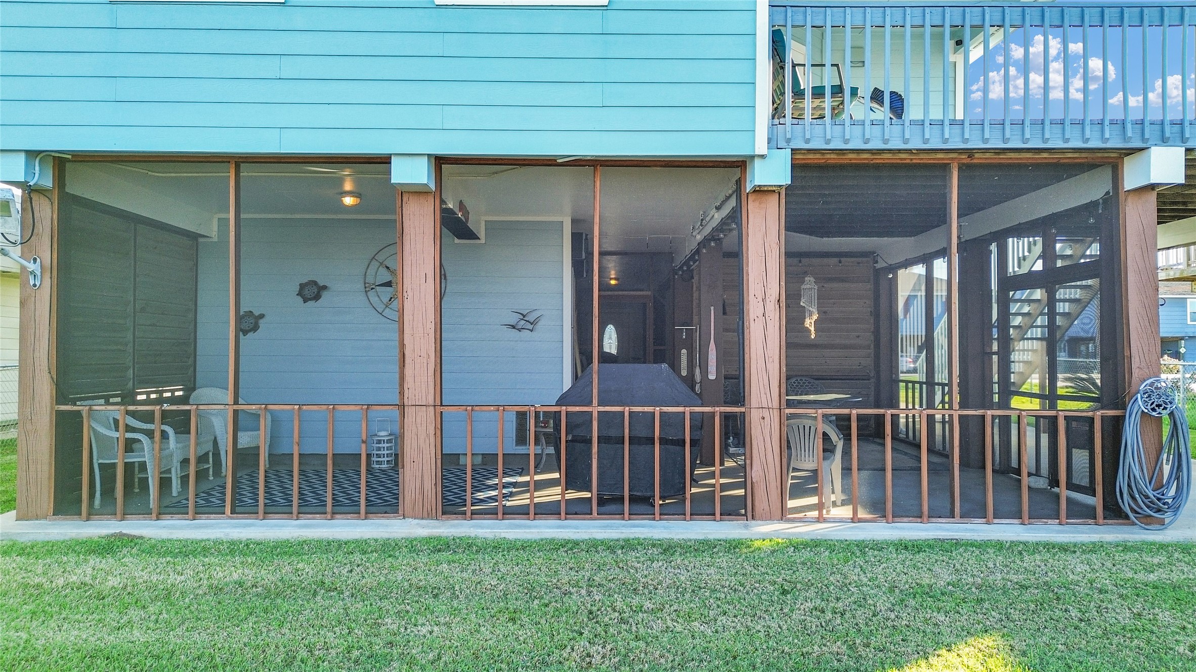 114 Four Master Road Freeport, TX 77541 - Photo 7 of 37 a view of a house with wooden deck and a yard
