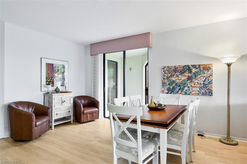 6500 Valen Way, Unit A305 Naples, FL 34108 - Photo 13 of 22 a view of a workspace with furniture and a window