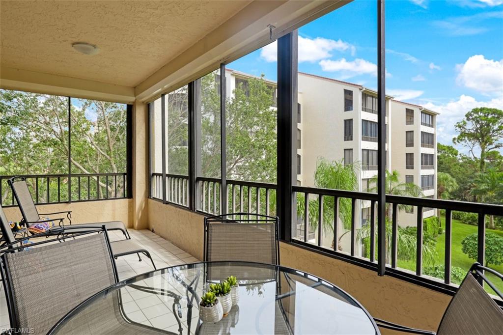 6500 Valen Way, Unit A305 Naples, FL 34108 - Photo 16 of 22 a view of a city from a balcony