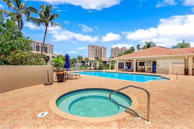 a view of a house with swimming pool