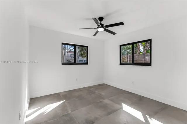 a view of a ceiling fan in a room