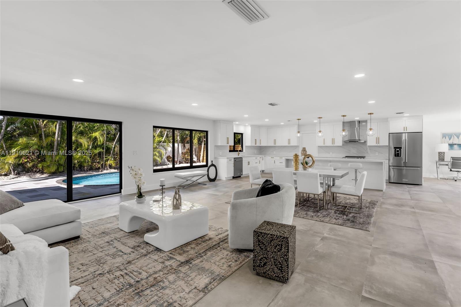 7120 Southwest 92nd Avenue Miami, FL 33173 - Photo 31 of 37 a living room with furniture and a large window