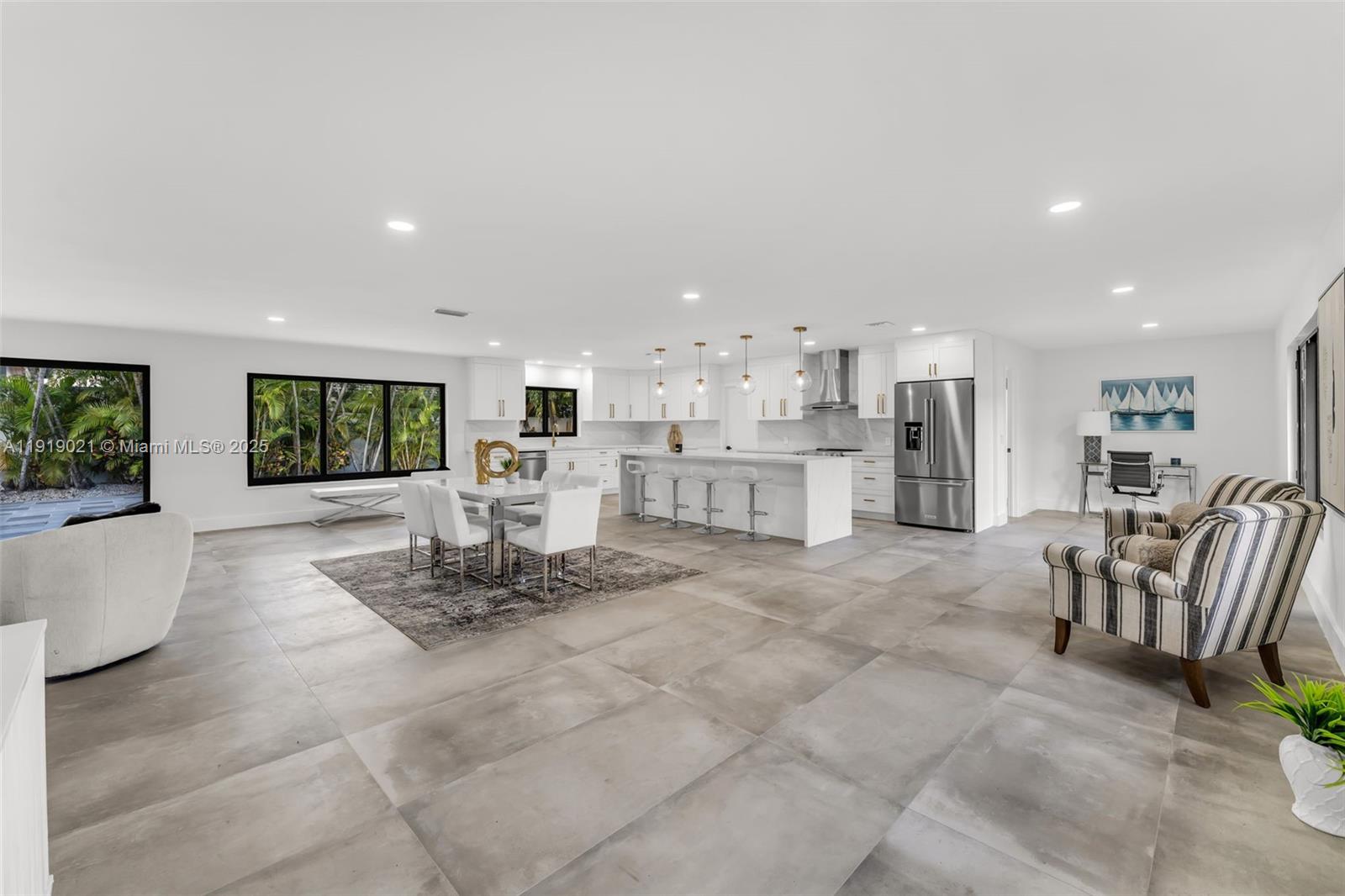 7120 Southwest 92nd Avenue Miami, FL 33173 - Photo 35 of 37 a living room with furniture and a table