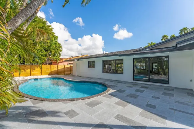 a view of outdoor space yard and swimming pool