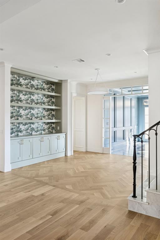 512 Bandit Trail Colleyville, TX 76034 - Photo 13 of 29 a view of an empty room with wooden floor and a window