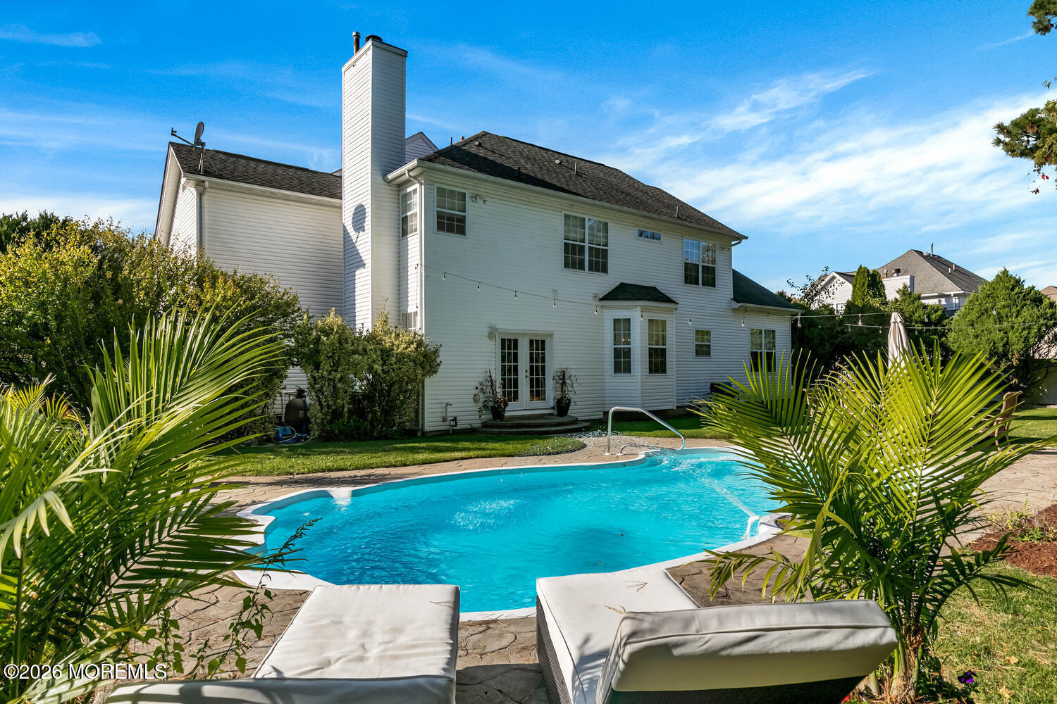 46 Woodview Drive Howell, NJ 07731 - Photo 15 of 17 a front view of a house with garden