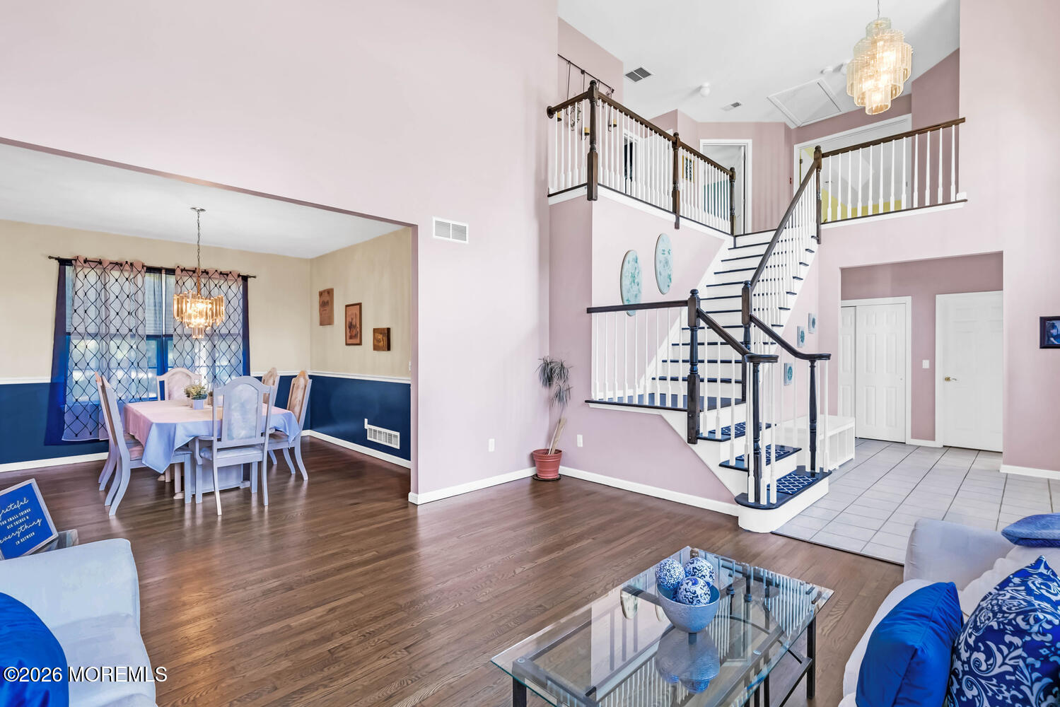 46 Woodview Drive Howell, NJ 07731 - Photo 3 of 17 a view of a livingroom and dining room and wooden floor