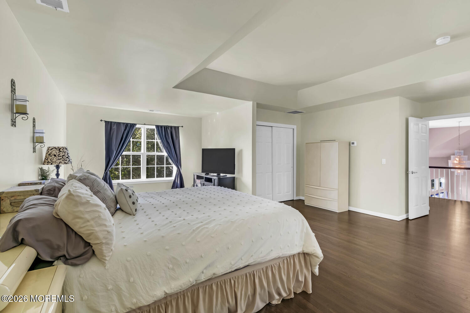 46 Woodview Drive Howell, NJ 07731 - Photo 10 of 17 a bedroom with a bed and a dresser