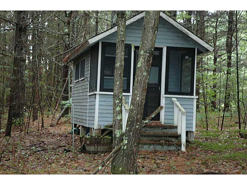 16 Raymond Cape Road Casco, ME 04015 - Photo 27 of 28 Exterior Front. First cottage with a...
