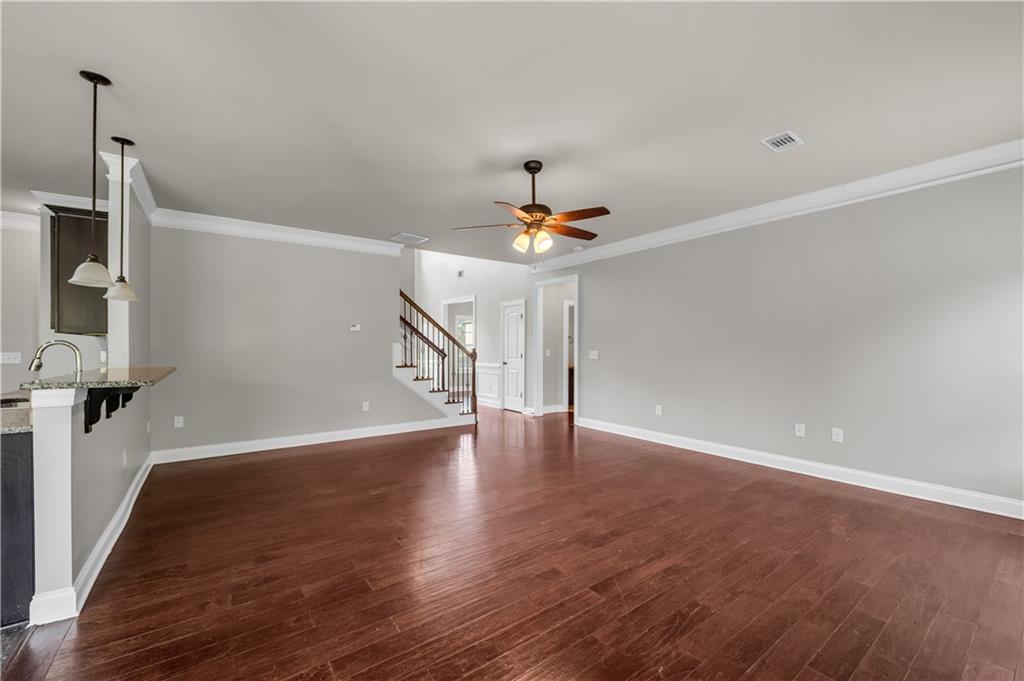 2626 Holden Spring Drive Dacula, GA 30019 - Photo 24 of 62 a view of empty room with wooden floor