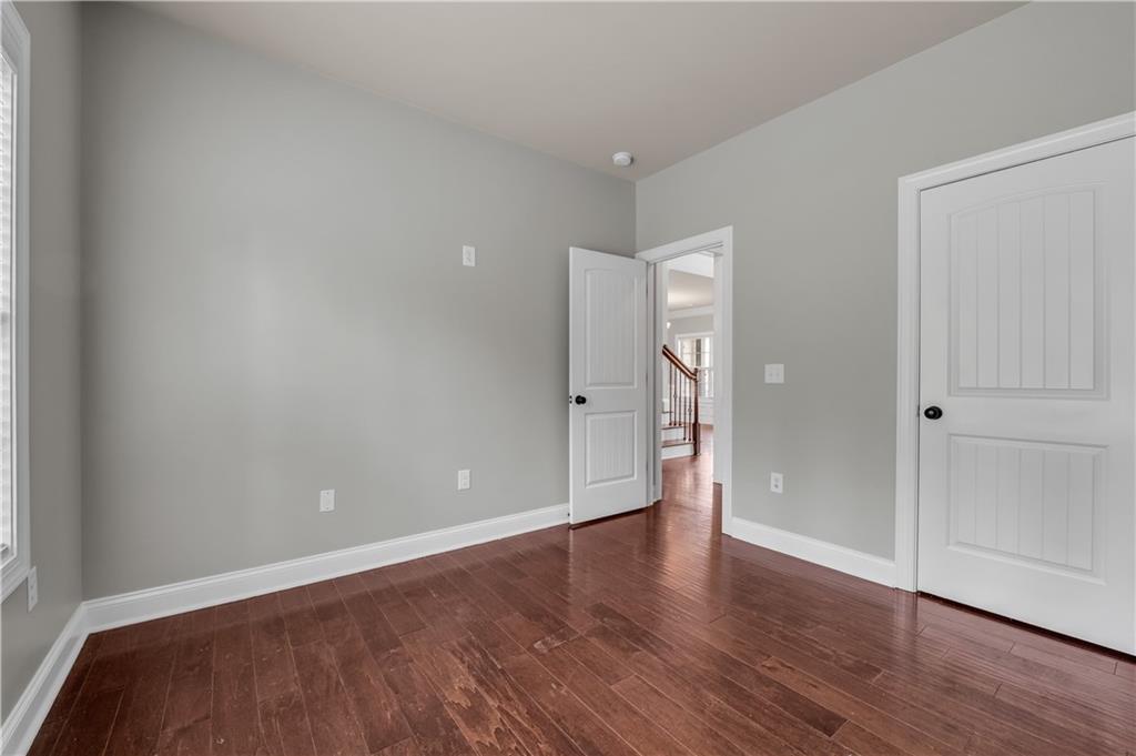 2626 Holden Spring Drive Dacula, GA 30019 - Photo 36 of 62 wooden floor in an empty room