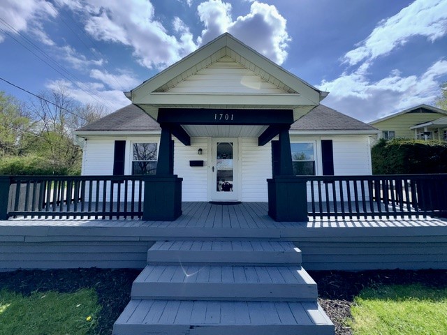 1701 West Jefferson Street Springfield, OH 45506 - Photo 1 of 18 This inviting residence features a welcoming porch, perfect for enjoying peaceful moments outdoors.