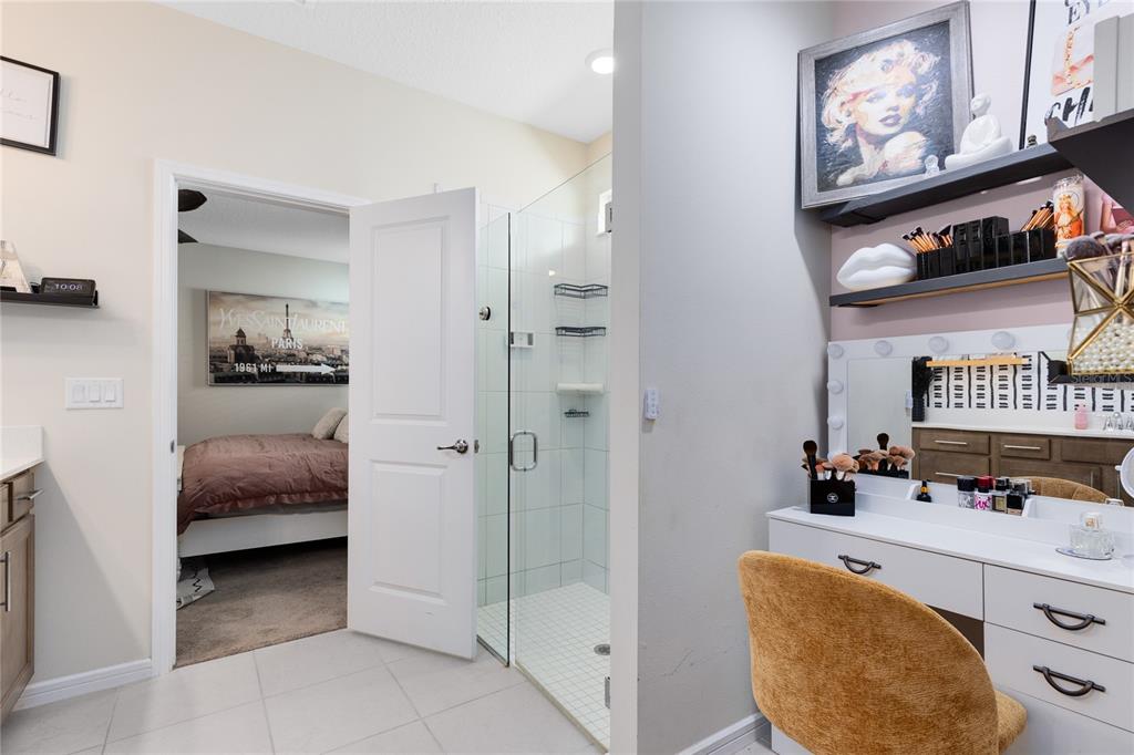 6528 Rover Way St. Cloud, FL 34771 - Photo 13 of 26 a bedroom with furniture and a mirror