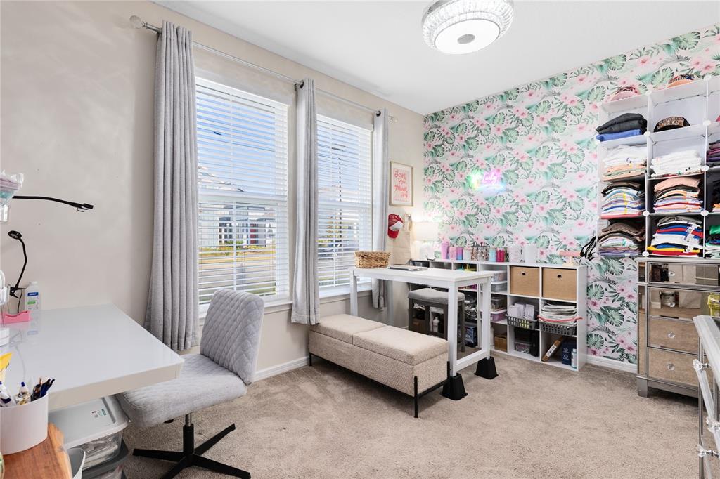 6528 Rover Way St. Cloud, FL 34771 - Photo 14 of 26 a bedroom with furniture and a window