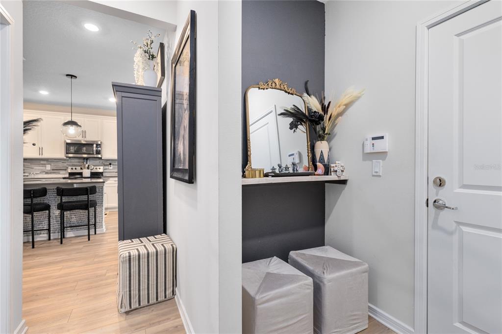 6528 Rover Way St. Cloud, FL 34771 - Photo 17 of 26 a kitchen with stainless steel appliances a refrigerator and a wooden floor