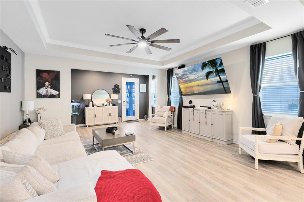 6528 Rover Way St. Cloud, FL 34771 - Photo 6 of 26 a living room with furniture and a flat screen tv