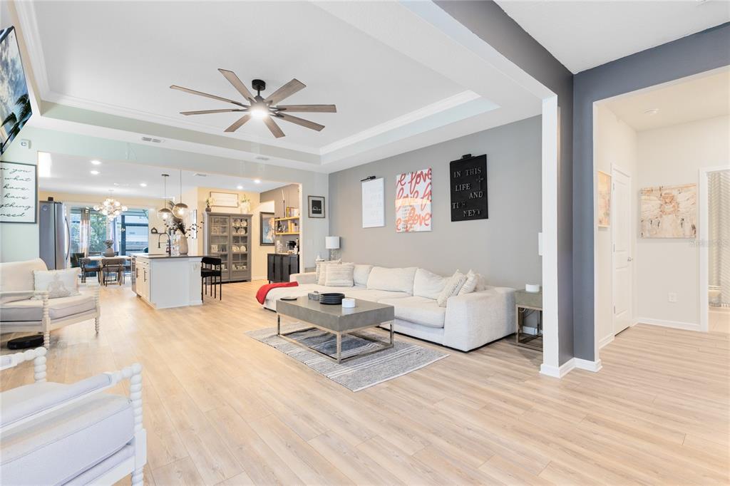 6528 Rover Way St. Cloud, FL 34771 - Photo 7 of 26 a living room with furniture and a wooden floor
