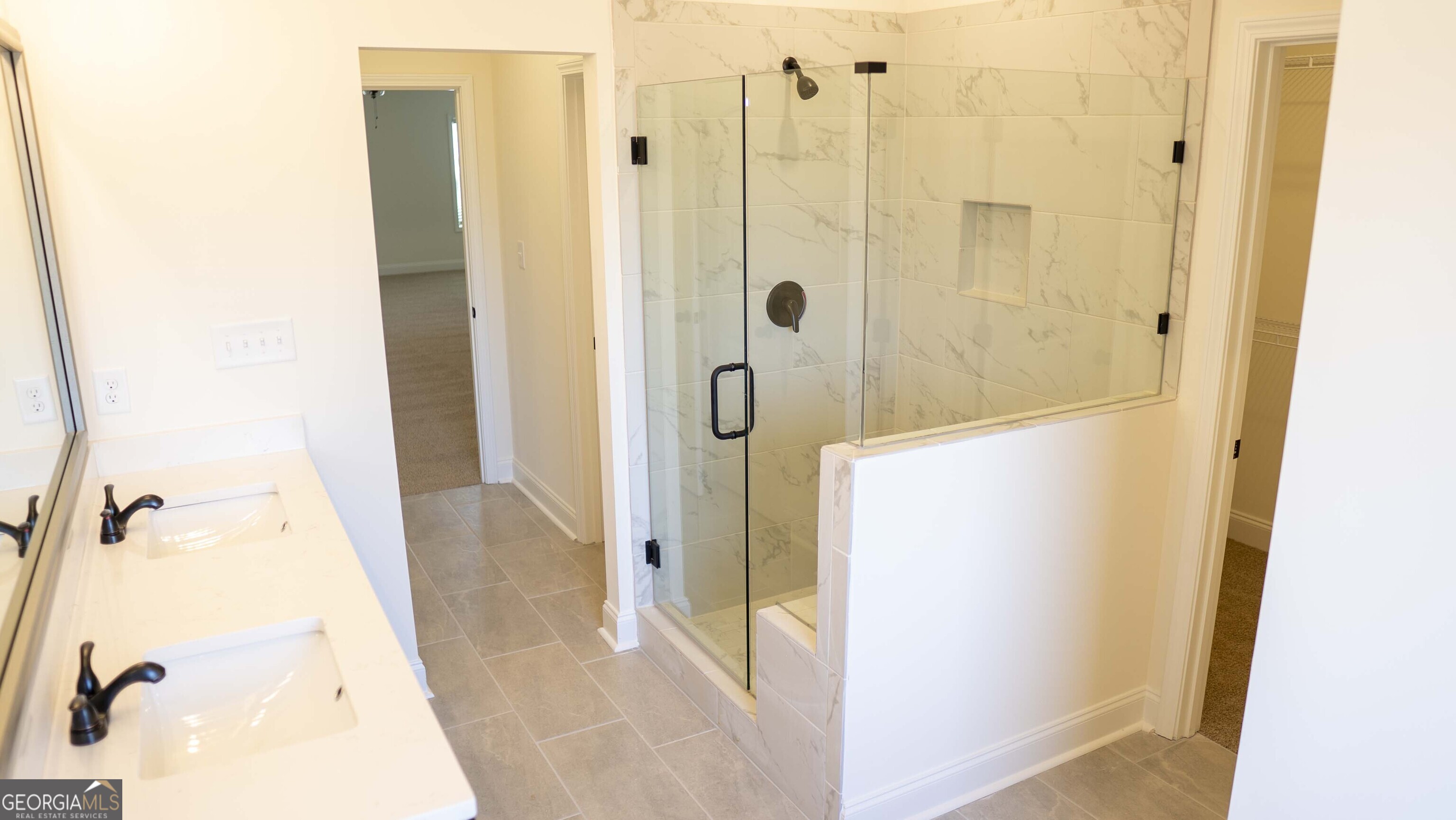 604 Beaver Court Perry, GA 31069 - Photo 24 of 40 a bathroom with a shower