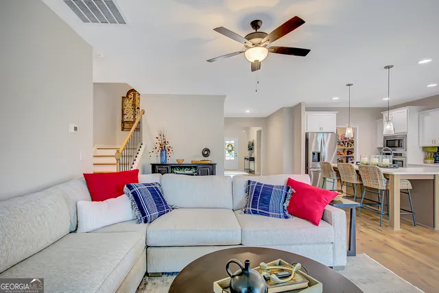 a bedroom with a bed and flat screen tv