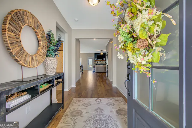 a view of a patio with couches and potted plants