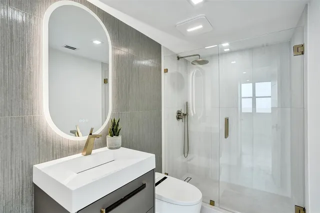 a view of table and chair with potted plants