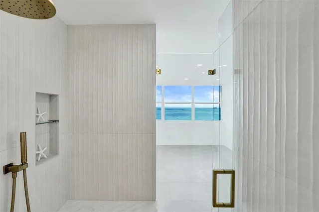 a kitchen with a sink stainless steel appliances and cabinets