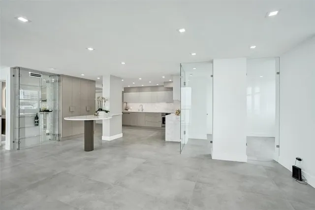 a living room with furniture and a gate