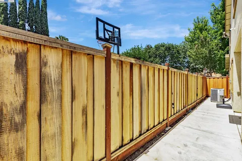 a view of a house with wooden floor and stairs