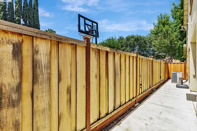 a view of a house with wooden floor and stairs
