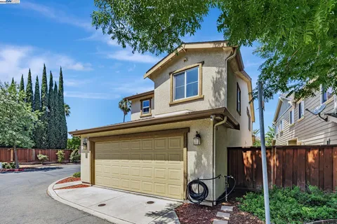 a view of a garden with a fountain