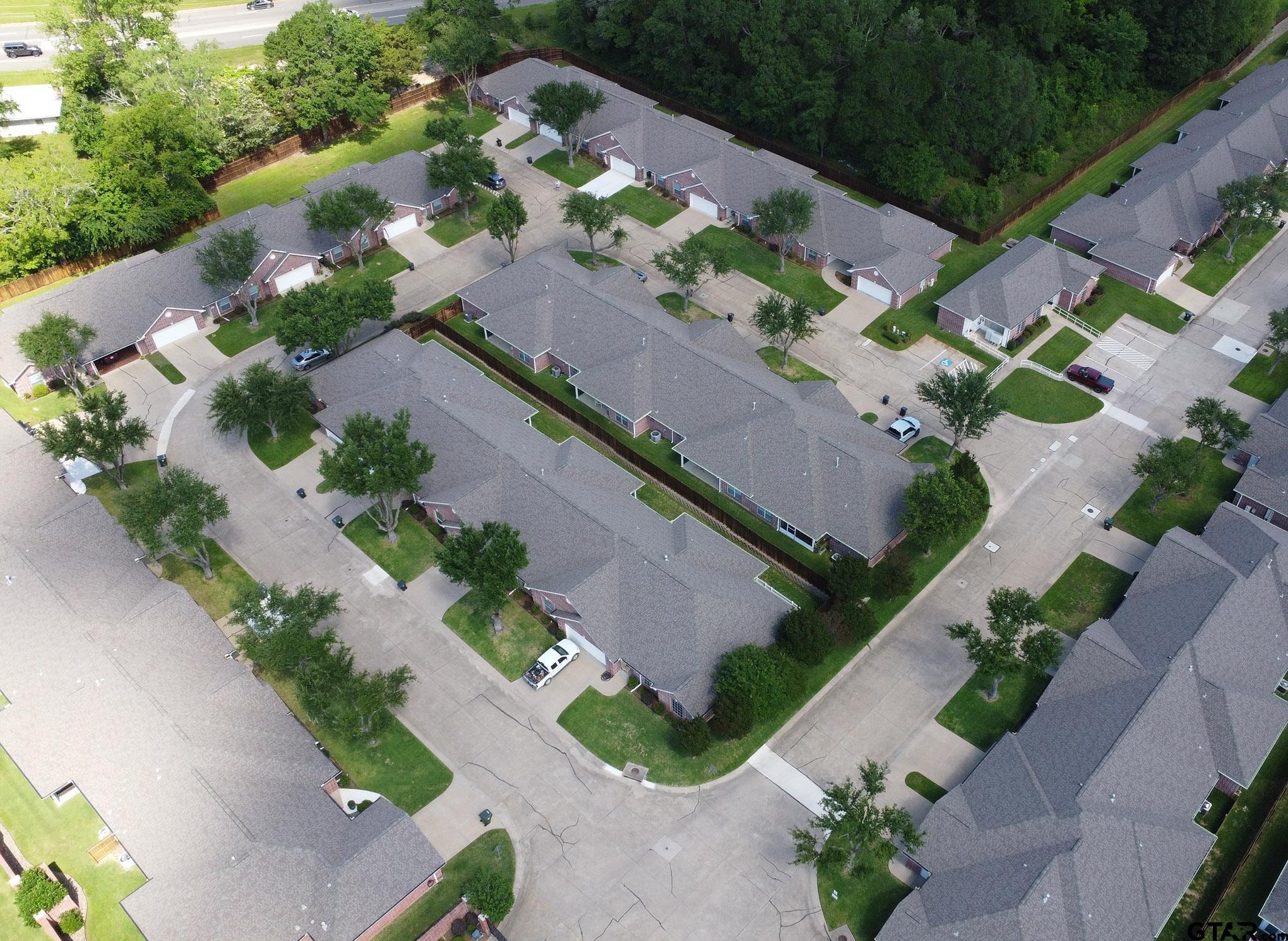 1521 Rice Road, Unit E105 Tyler, TX 75703 - Photo 30 of 32 an aerial view of a house