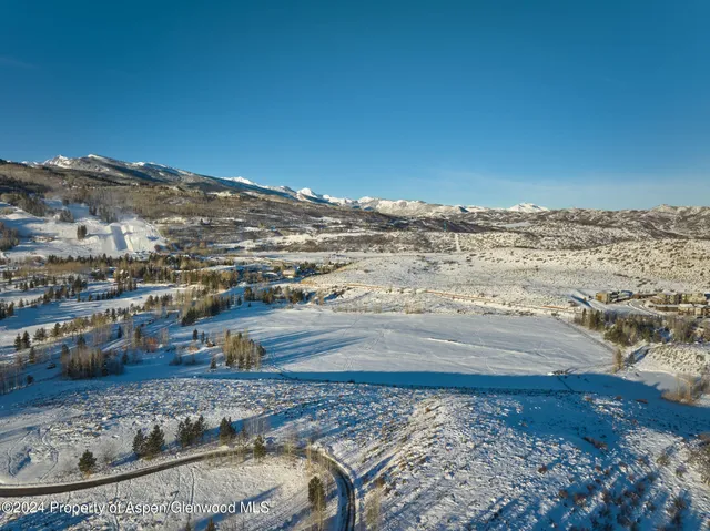 a view of a water with mountain