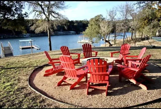 a view of balcony with table and chairs