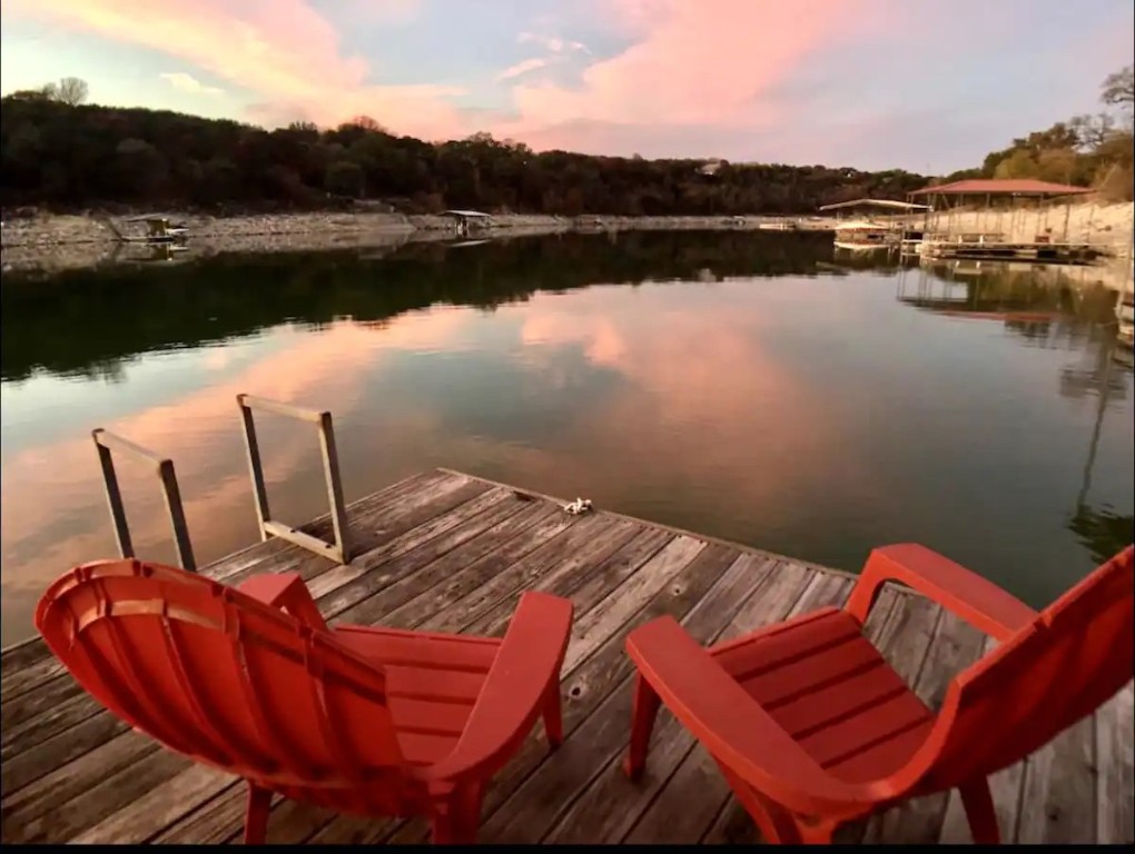11000 Beach Road Leander, TX 78641 - Photo 2 of 38 a view of balcony with table and chairs