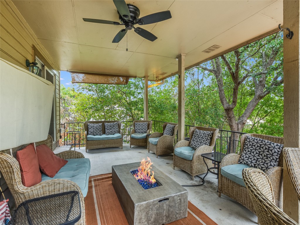 11000 Beach Road Leander, TX 78641 - Photo 22 of 38 a living room with furniture and a large window