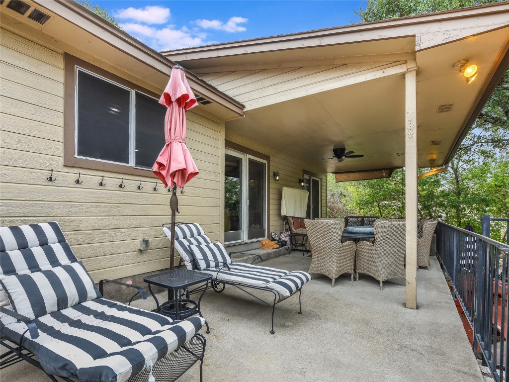 11000 Beach Road Leander, TX 78641 - Photo 23 of 38 a view of a patio with couches chairs and potted plants