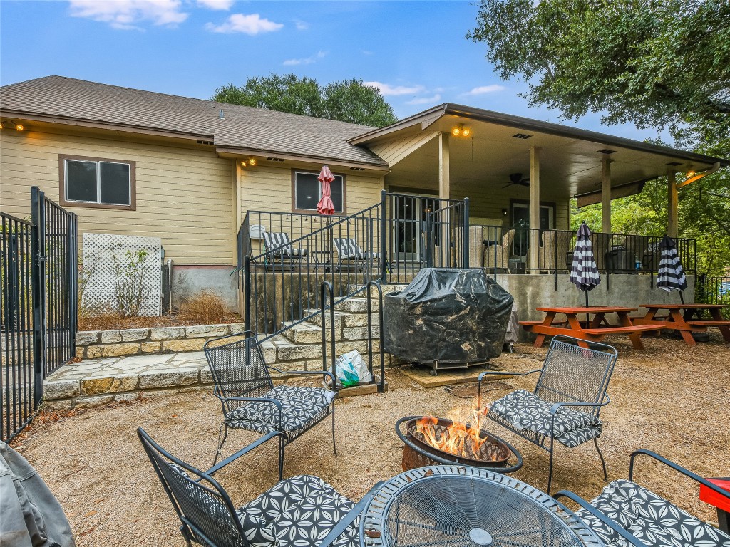 11000 Beach Road Leander, TX 78641 - Photo 25 of 38 a backyard of a house with yard and outdoor seating