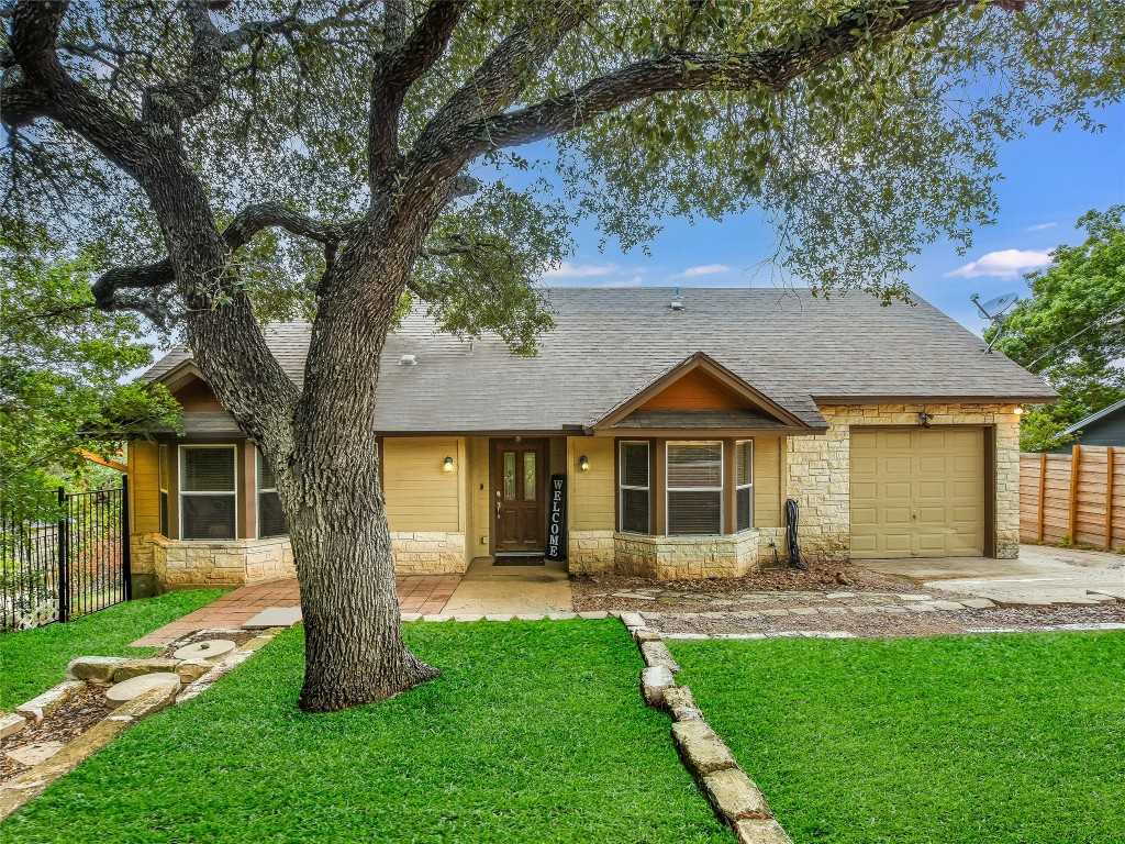 11000 Beach Road Leander, TX 78641 - Photo 5 of 38 a front view of house with yard and green space