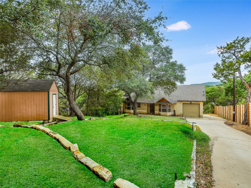 11000 Beach Road Leander, TX 78641 - Photo 6 of 38 a view of a house with a yard porch and sitting area