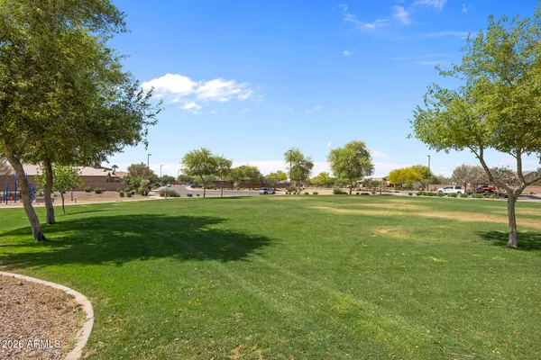 a view of a golf course with a lake
