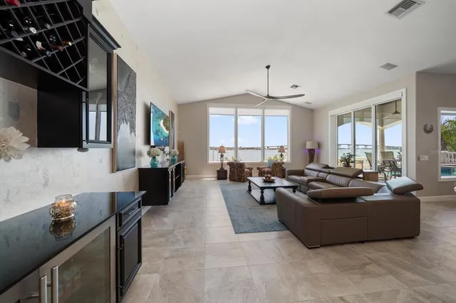 a view of a house with a yard porch and furniture