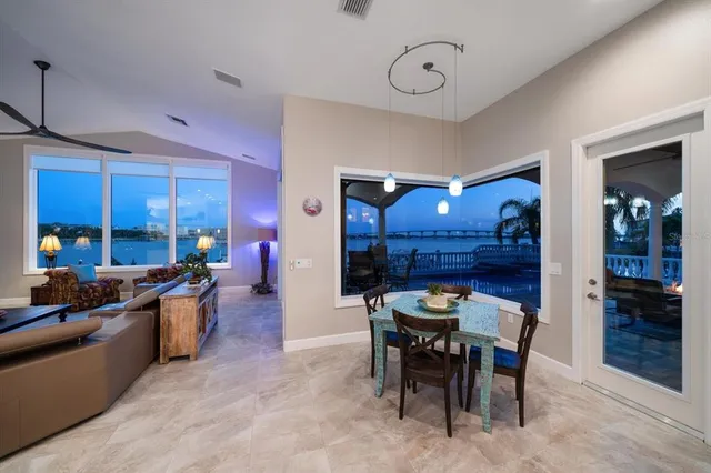 a view of a balcony with wooden floor