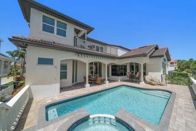 a spacious bathroom with a double vanity sink mirror and double