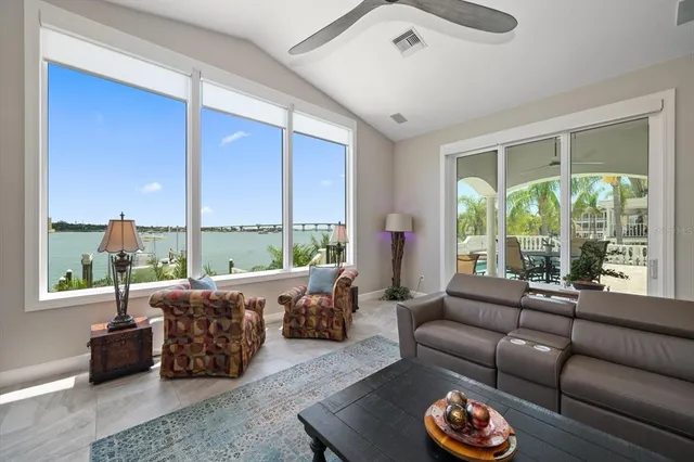 a view of a chairs and table in a patio