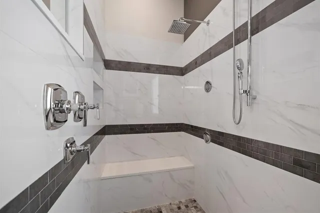 a living room with fireplace furniture and a flat screen tv