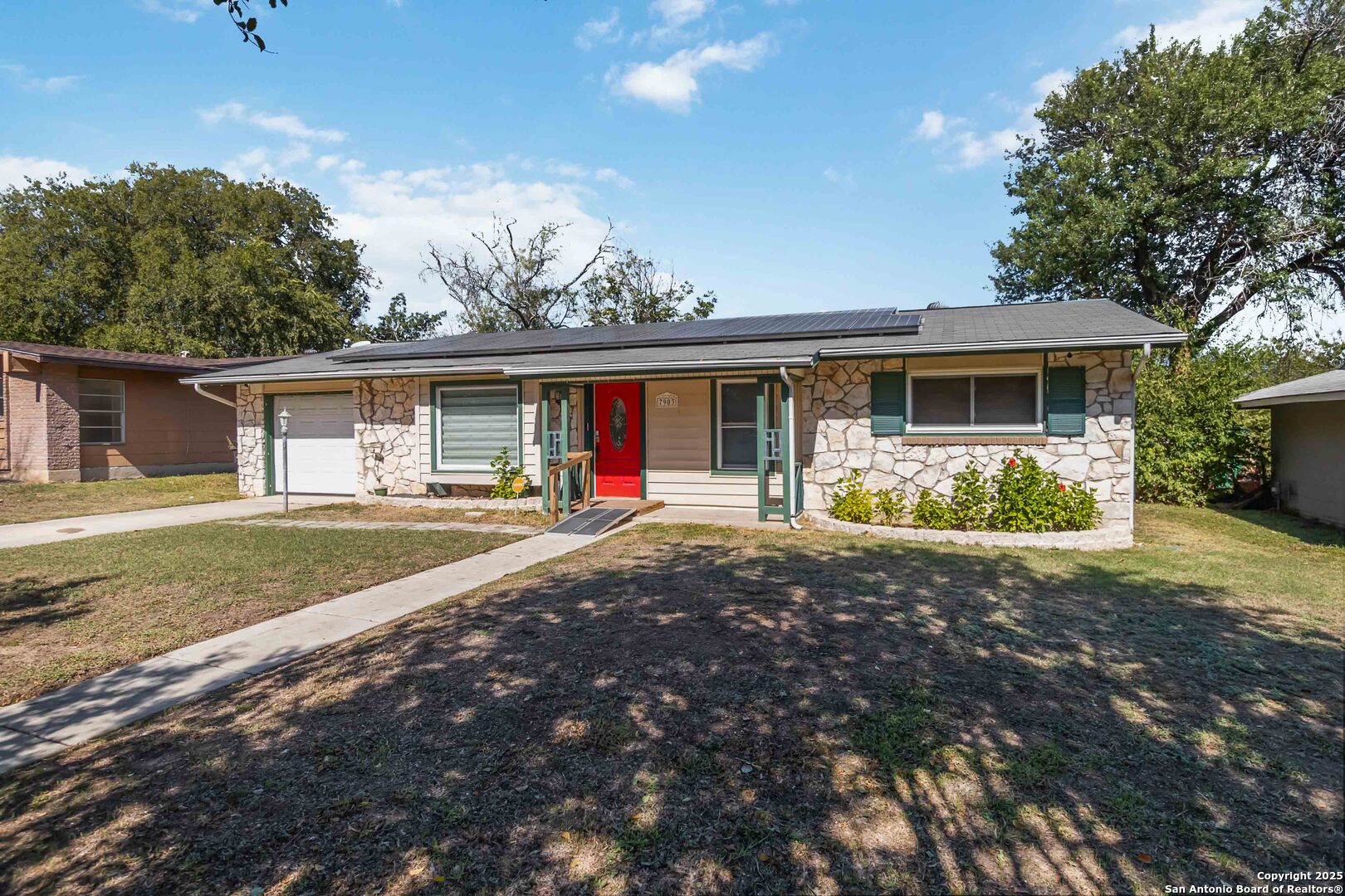 7903 Rimfire Drive San Antonio, TX 78227 - Photo 3 of 25 a front view of house with yard and green space