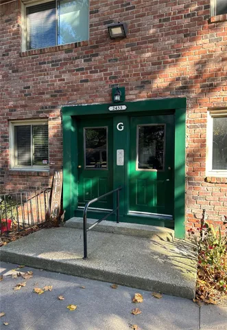 a front view of a house with a garage