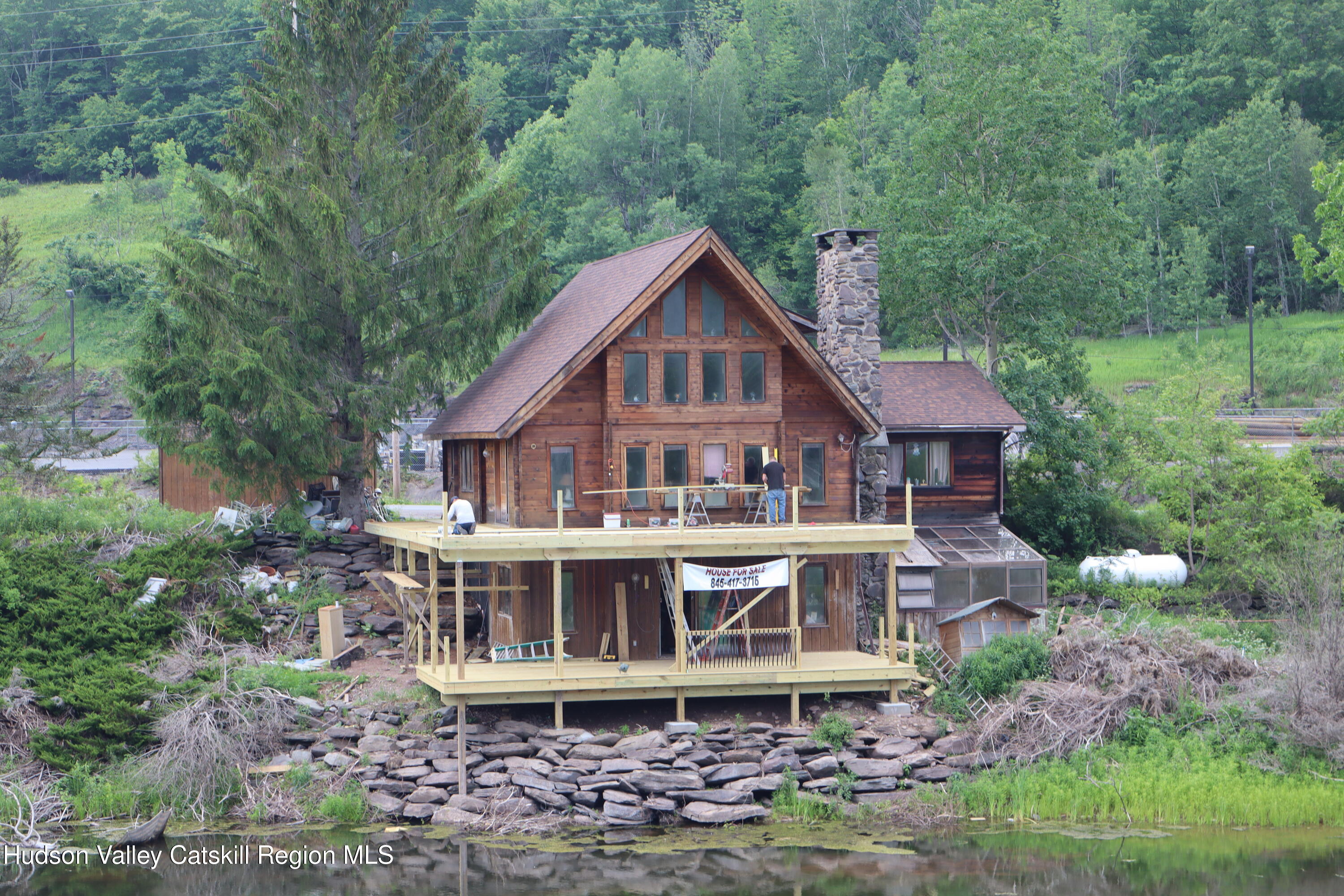 86 Old Rte 28 Fleischmanns, NY 12430 - Photo 5 of 12 a front view of a house with a garden