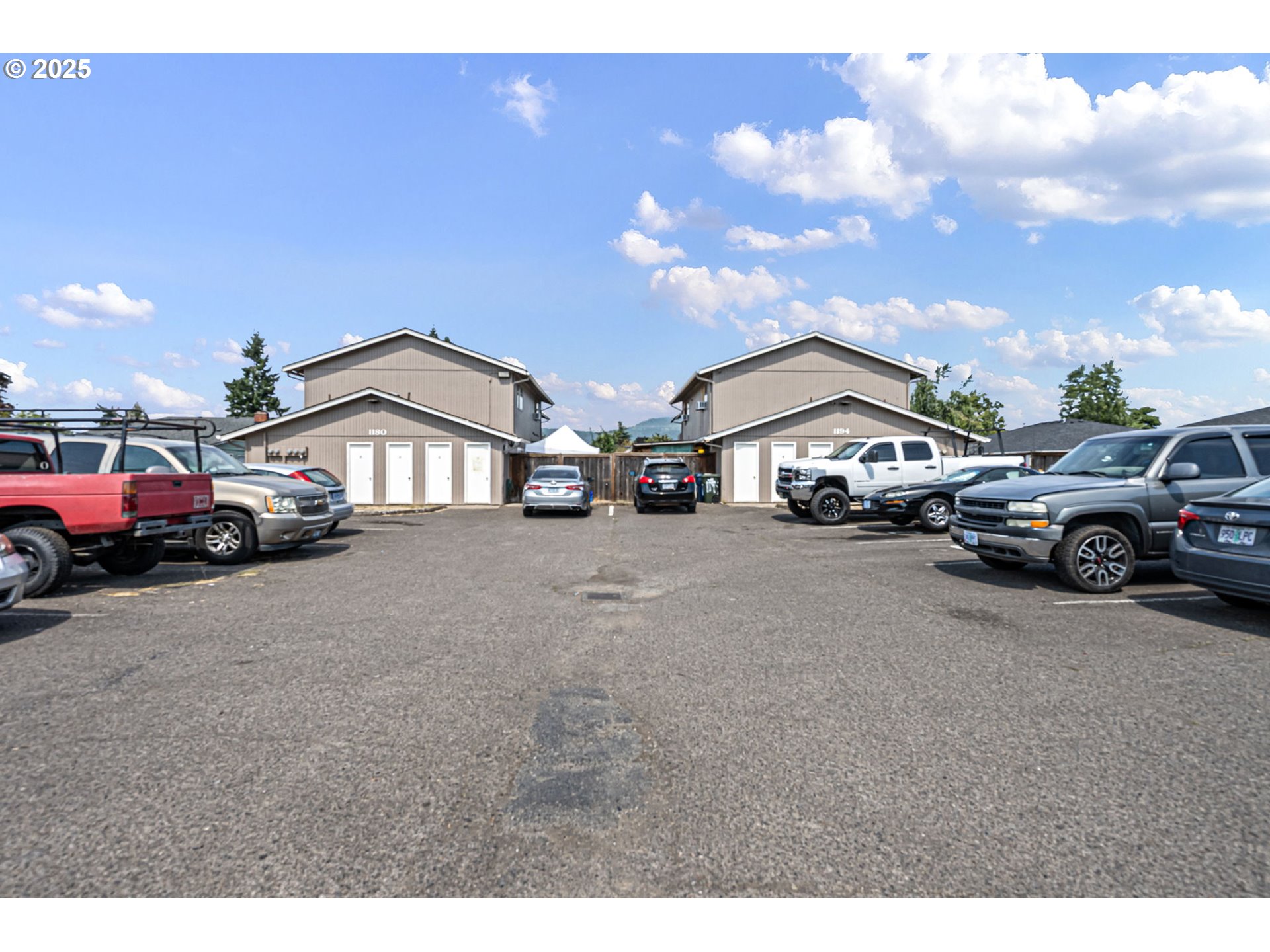 a view of a car parked in front of a house